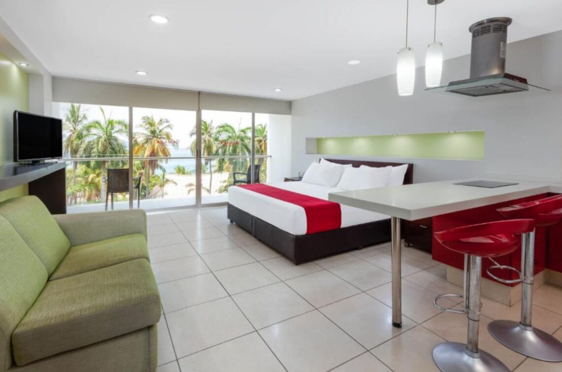 Located in Acapulco, a few steps from Hornos and Hornitos Beach, Ramada by Wyndham Acapulco Hotel & Suites provides accommodations with a restaurant, free private parking, an outdoor swimming pool and a bar. Among the facilities at this property are a shared lounge and a concierge service, along with free WiFi throughout the property. The property has a 24-hour front desk, room service and currency exchange for guests. All guest rooms at the hotel come with air conditioning, a seating area, a flat-screen TV with cable channels, a kitchen, a dining area, a safety deposit box and a private bathroom with a shower, a hairdryer and free toiletries. The rooms feature a closet. Ramada by Wyndham Acapulco Hotel & has a sun terrace. Popular points of interest near the accommodation include Manzanillo Beach, San Diego Fort and Acapulco Cathedral. The nearest airport is General Juan N Alvarez International Airport, 14 miles from Ramada by Wyndham Acapulco Hotel & Suites.